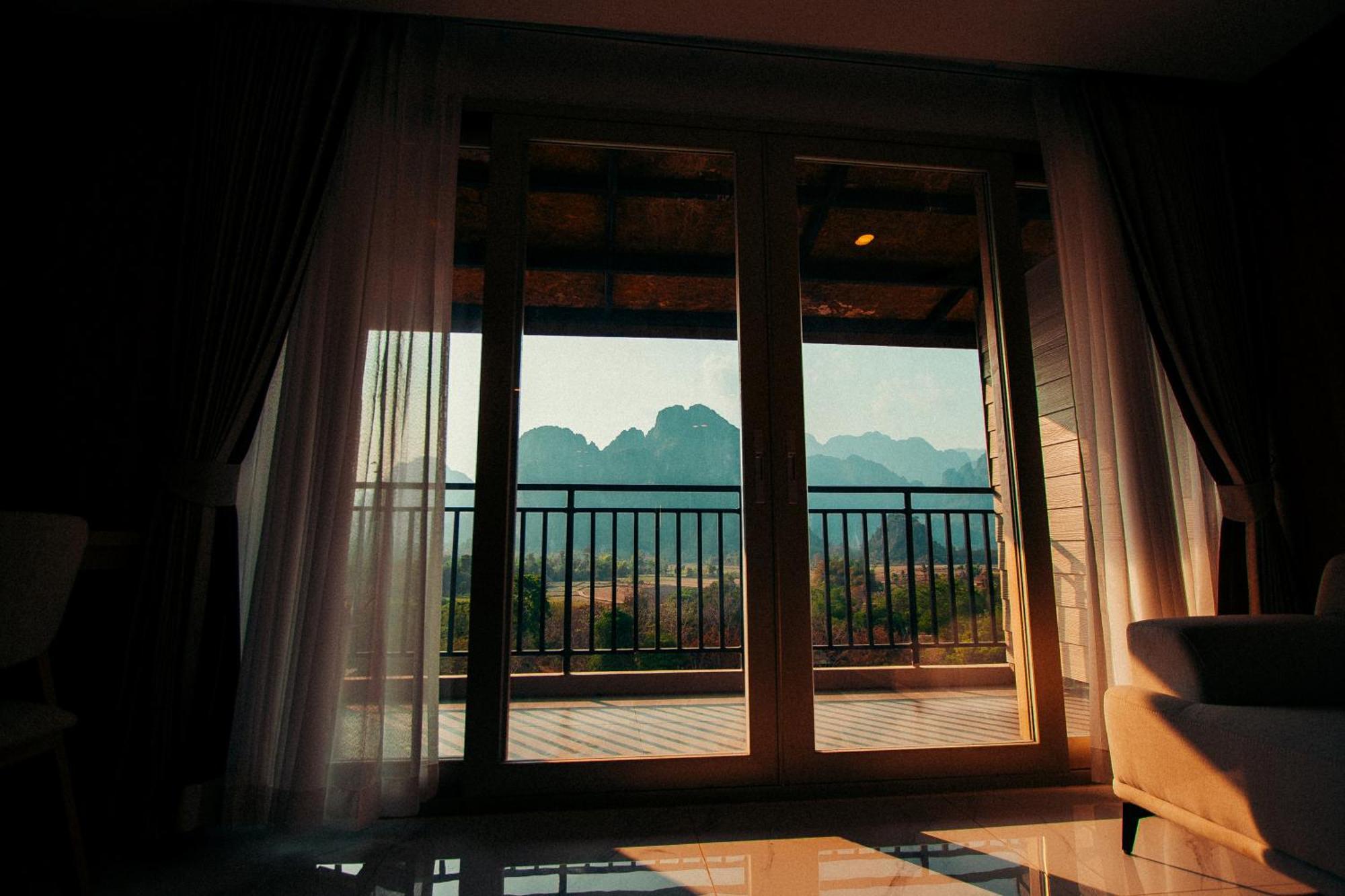 The Elephant Crossing Hotel Vang Vieng Bagian luar foto